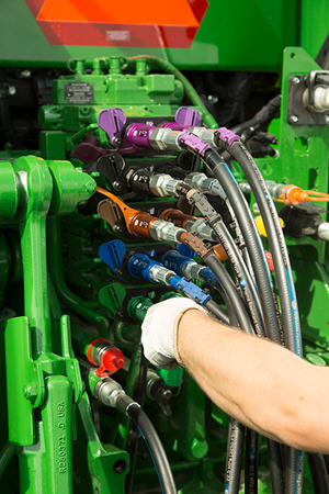 How to Disconnect Hydraulic Hose from John Deere Tractor  